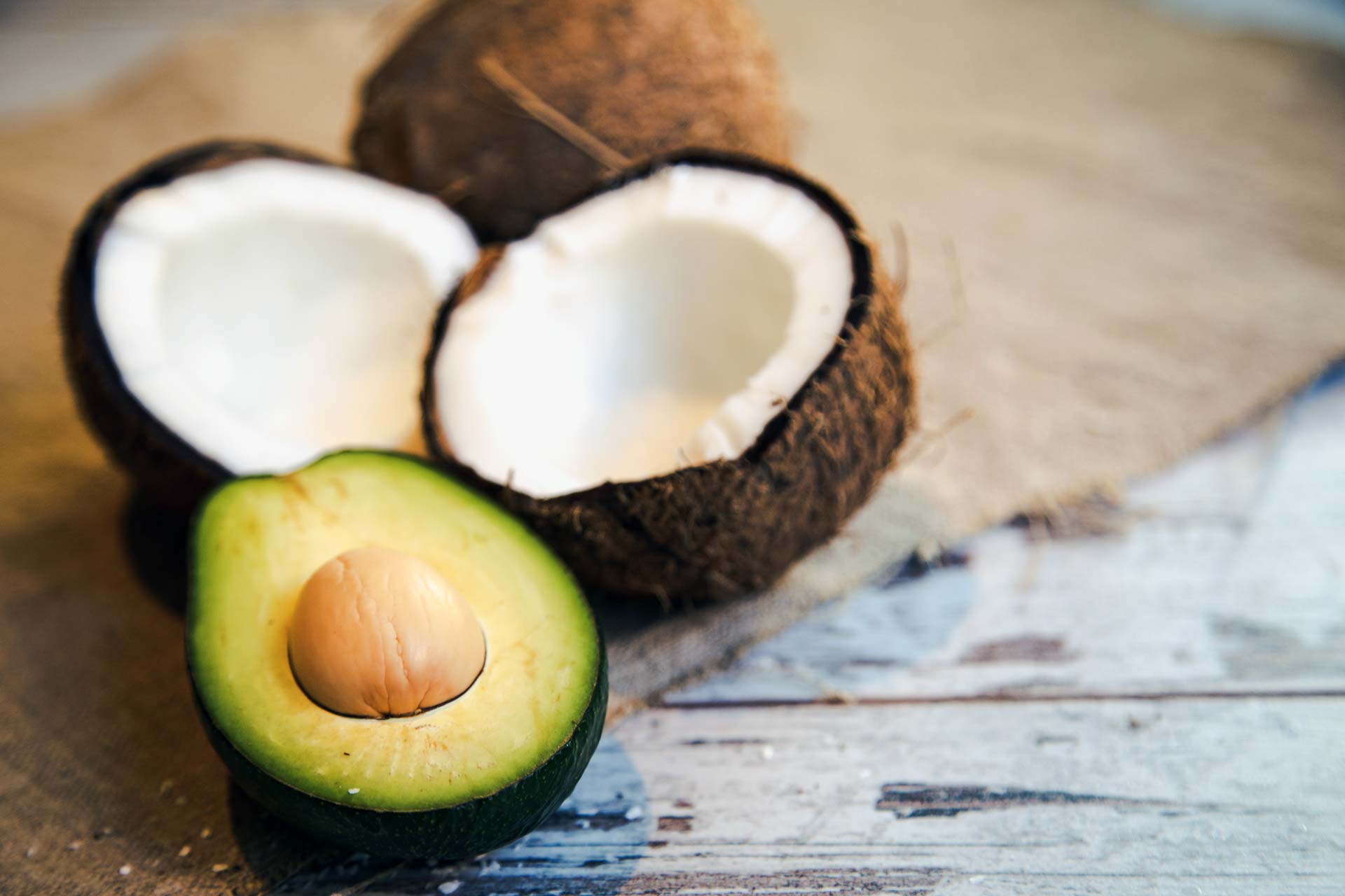 Coconut and avocado sliced open